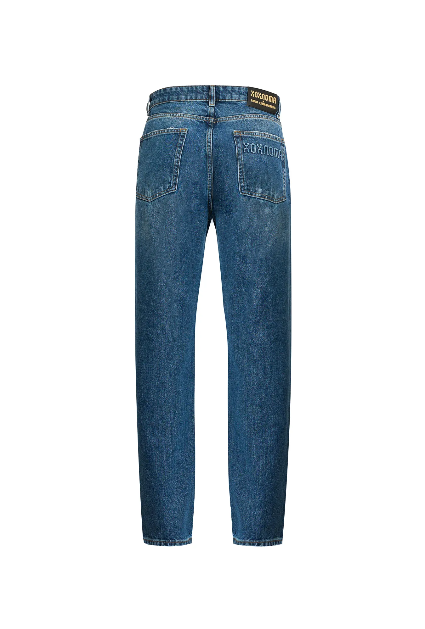 Джинсы с эффектом потертости