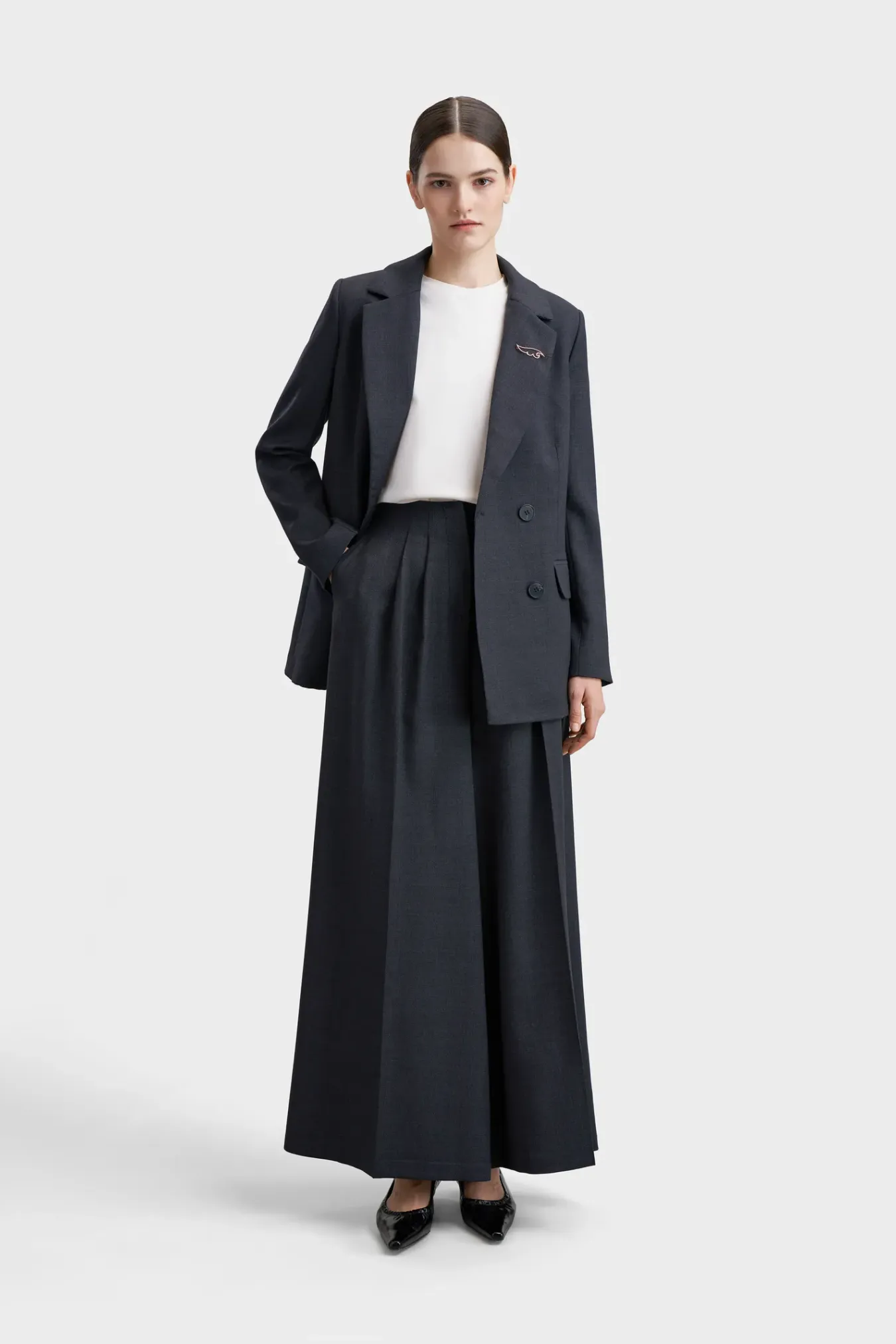 Расклешенные брюки из премиальной шерсти